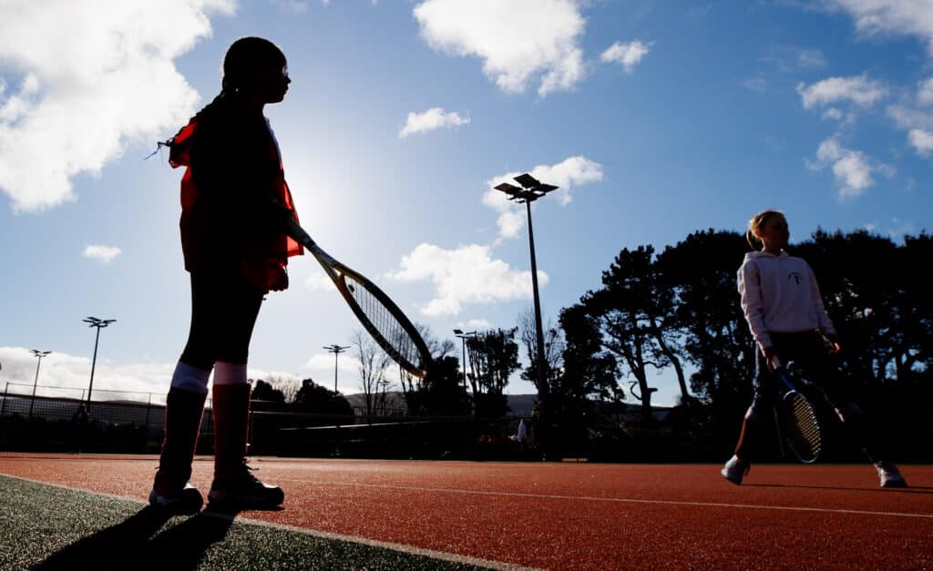Close Up View Of Children With Tennis Rackets