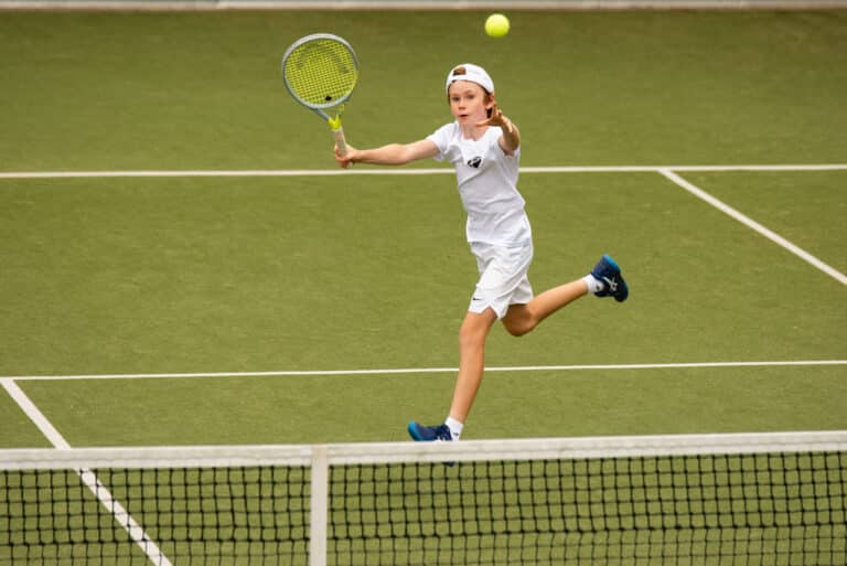 Junior Open Thursday 22 Boy Focused On Tennis Ball