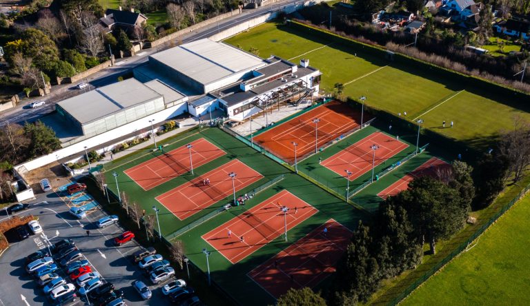Aerial view of several outdoor tennis courts