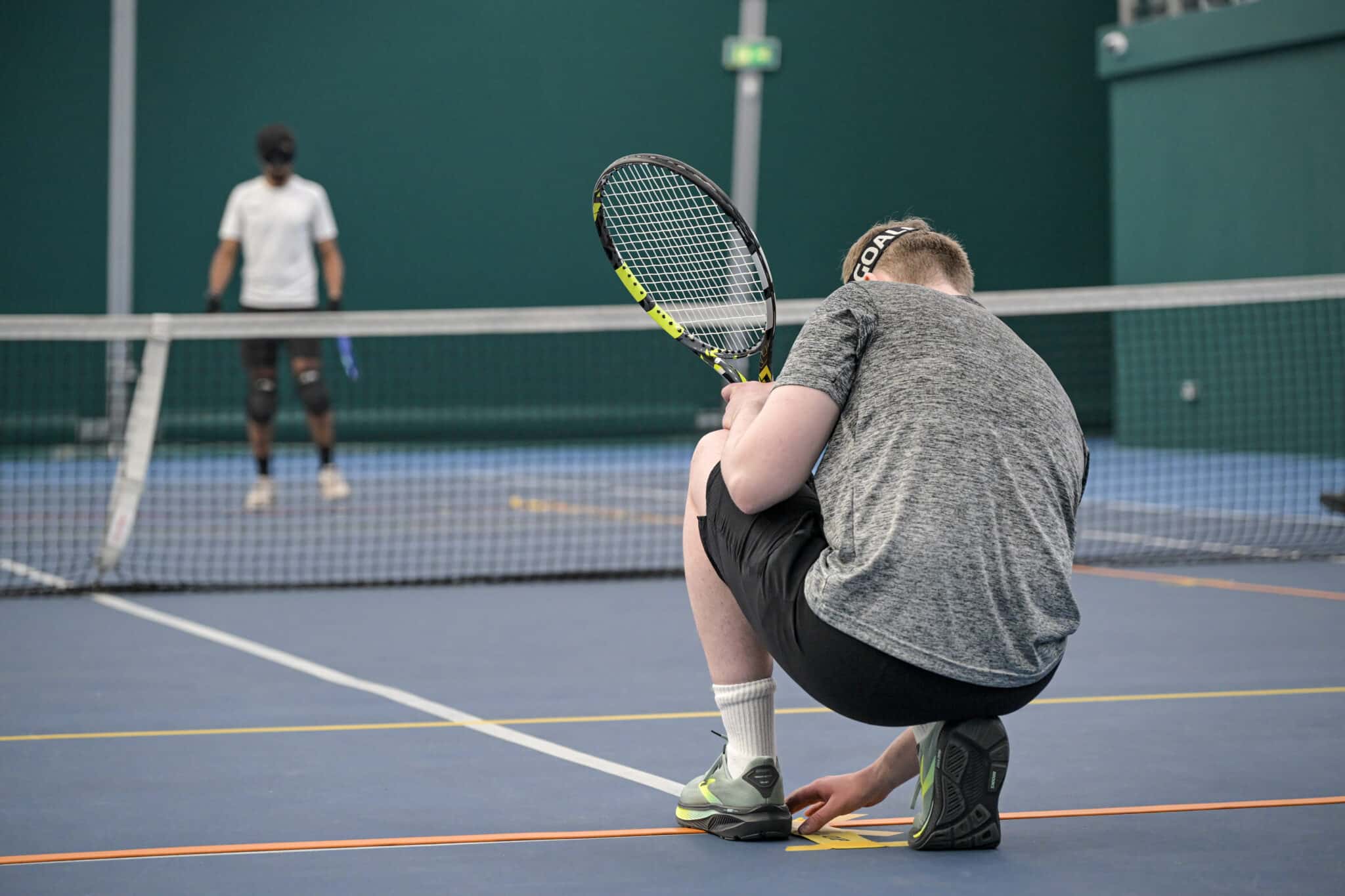 Blind and VI tennis players on court