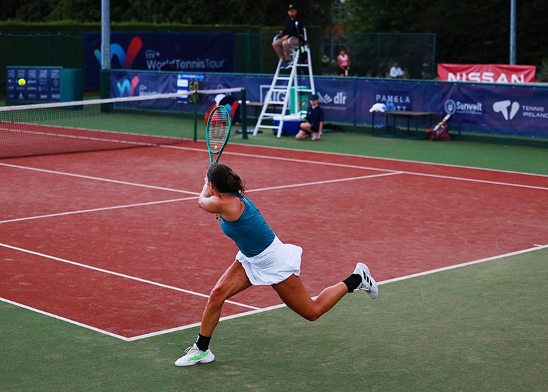 Jodie Burrage strikes a backhand at the 2026 DLR Irish Open